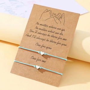 Bracelets tressés bleu avec cœur pour couples sur carte cadeau avec illustrations