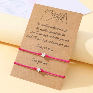 Star charm woven bracelets on a kraft gift card with sentimental friendship message