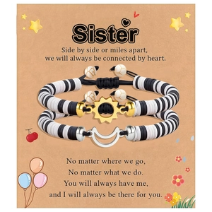 Detail of sun and moon friendship bracelets for sisters on illustrated gift card