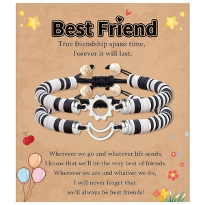 Handmade Sun and Moon Heishi bead friendship bracelets with adjustable black cord on card