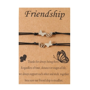 Set de bracelets d'amitié avec breloques papillon en acier sur carte message