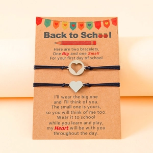 Detail of hand-woven heart bracelets on a Back to School card for mother and daughter