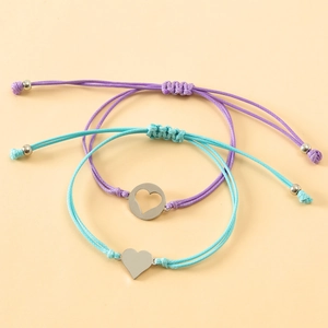 Detail of hand-woven adjustable heart charm bracelets for mother and daughter