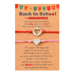 Detailed view of woven heart bracelets for mother and daughter on back to school gift card