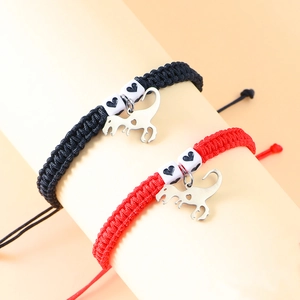 Handmade stainless steel dinosaur charm bracelets with woven heart beads for couples