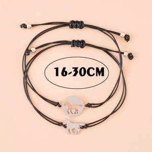 Detail of adjustable black woven horse charm bracelets showing 16-30cm circumference
