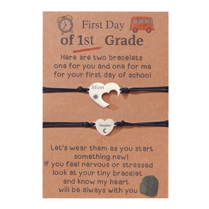 Detail view of heart mother daughter bracelets for the first day of school card gift.