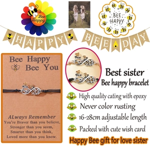 Detail of bee friendship bracelets with infinity sister charm on a wish card display