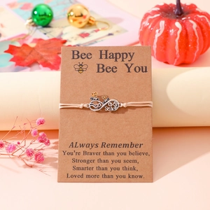 Handmade woven sister friendship bracelet with silver infinity symbol and bee charm detail