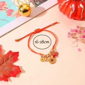 Detalle de la pulsera tejida de girasol ajustable con cuentas naranjas e indicador 16-28cm