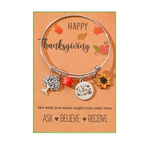 Stainless steel charm bracelet with tree of life and Talk Turkey To Me pendant