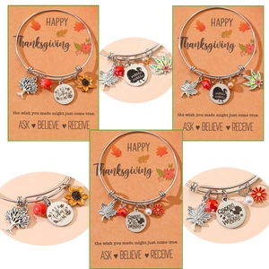 Stainless steel Thanksgiving charm bracelet with maple leaf, sunflower, and pearl pendants