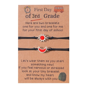 3rd grade back to school bracelets with sun and moon charms on a kraft card