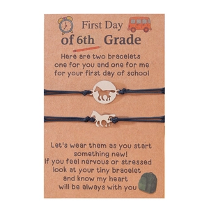 6th Grade first day woven bracelets with horse charms on a gift message card