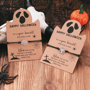 Gothic Halloween spider web wish bracelets with silver pendants on ghost-shaped cards
