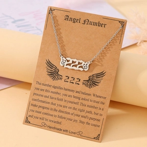 Detailed view of silver stainless steel 222 angel number necklace with wing charm