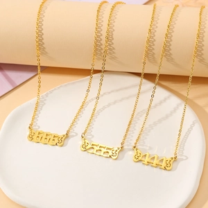 Golden angel wing butterfly necklaces showing 444, 555 and 666 angel number pendants
