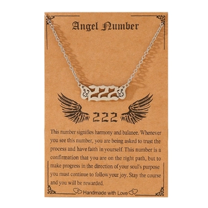 Silver angel number 222 necklace with butterfly wings pendant on kraft display card