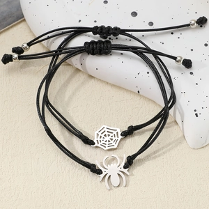 Handwoven stainless steel spider and web charms on adjustable black cord bracelets