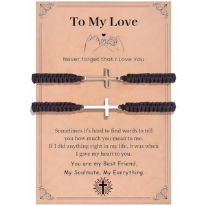 Detail of woven cross couple bracelets on a To My Love gift card display stand