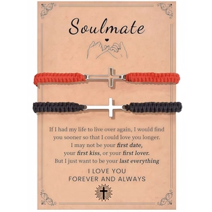 Detail of woven cross couple bracelets on a Soulmate message card for gift giving