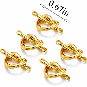 Detailed view of 5 golden heart knot connectors with size mark for jewelry DIY making