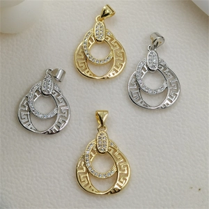 Gold and silver double ring pendant necklaces with Greek meander patterns and zircons