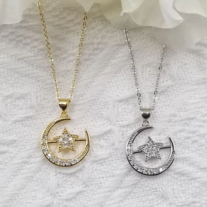 Elegant gold and silver crescent moon and star necklaces with sparkling zircon pendants