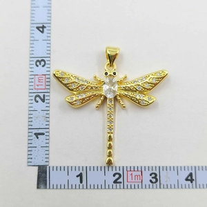 Size measurement of a gold plated dragonfly pendant with micro-pave cubic zirconia crystals