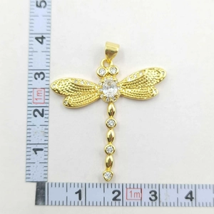 Dragonfly pendant size measurement showing 42mm width with micro-pave cubic zirconia