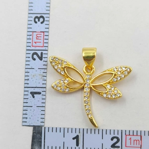 Detailed scale measurement showing the size of the micro-paved dragonfly pendant