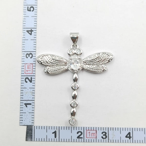Size measurement of dragonfly pendant showing dimensions of 4.3cm height and 4.2cm width