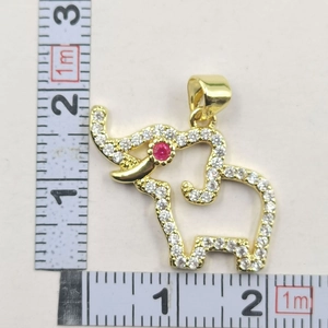 Detailed measurement of gold-plated elephant pendant with cubic zirconia and red gem eye
