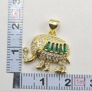 Detailed size measurement of a gold elephant pendant with green stones and zircons