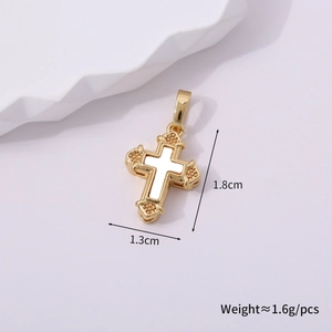 Macro view of vintage gold cross pendant with shell inlay showing 1.8cm height dimensions