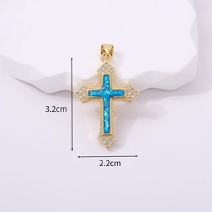 Macro shot showing 3.2cm religious cross pendant with blue opal and gold zircon stones