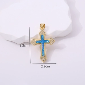 Detail of cross pendant with blue opal center and white zircons, size 3.2cm by 2.2cm