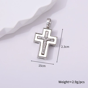 Detail view of small silver cross crucifix pendant measuring 2.3cm by 1.5cm with top loop
