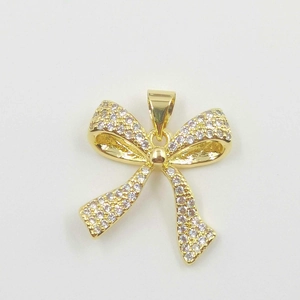 Elegant gold plated bow necklace pendant with sparkling cubic zirconia pavé setting