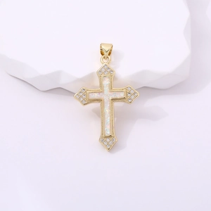 Religious golden cross necklace with colorful zircon pendant on white wavy display stand