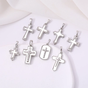 Vintage silver cross pendants with mother of pearl inlay and religious crucifix details