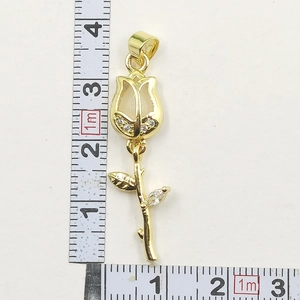 Detailed view of golden rose pendant with white zircons showing 4.2cm height and 1.3cm width