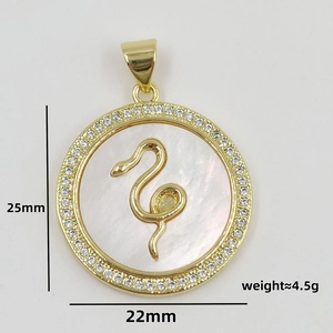 Macro detail of snake shell pendant with dimensions 25mm height and 22mm width