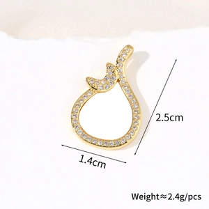 Detail view of 18k gold plated shell pendant with zircon inlay and size measurements
