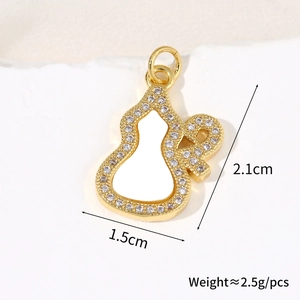 Macro detail of 18k gold plated gourd pendant with size markings and zircon inlay