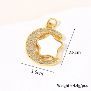 Macro detail of star and moon pendant with size 2.8cm and gold-plated finish