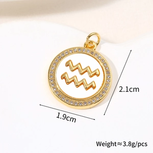 Detail view of round gold Aquarius shell pendant with dimensions 2.1cm by 1.9cm