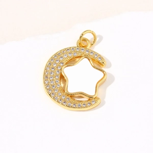 Star and moon shell pendant in gold finish with micro-set zircon stones and white enamel