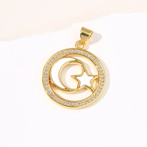 Elegant gold celestial pendant with moon and star shell center and sparkling crystals