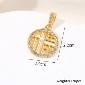 Detailed view of Fu character gold-plated pendant with white zircon inlay and 2.2cm size